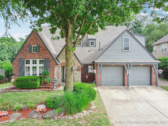 3701 W Dallas St, Broken Arrow, OK 74012 - view of front of house featuring concrete driveway, roof with shingles, and brick siding