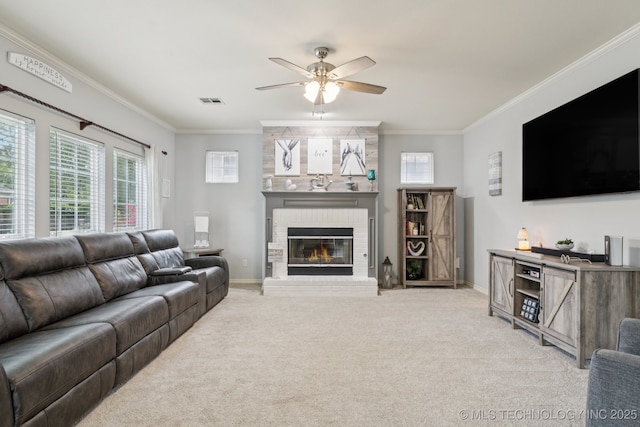 3701 W Dallas St, Broken Arrow, OK 74012 - living room featuring ornamental molding, a brick fireplace, light colored carpet, and a ceiling fan