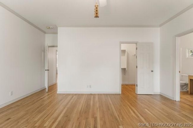 1620 S Florence Pl, Tulsa, OK 74104 - unfurnished room with ornamental molding and light wood-type flooring