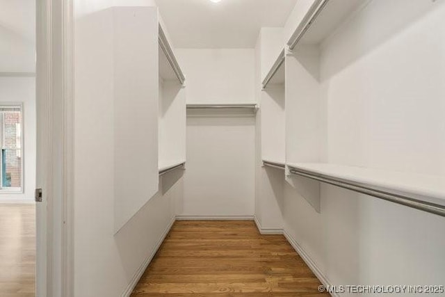 1620 S Florence Pl, Tulsa, OK 74104 - walk in closet with light wood finished floors