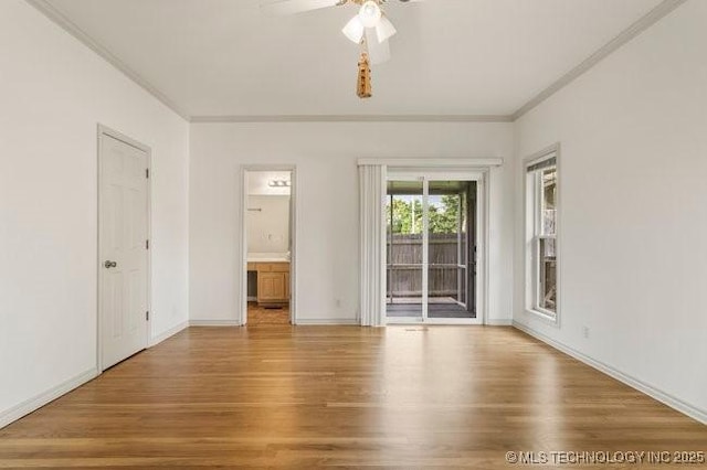 1620 S Florence Pl, Tulsa, OK 74104 - empty room with ornamental molding, wood finished floors, and ceiling fan