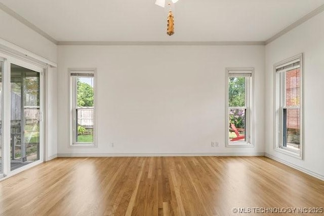 1620 S Florence Pl, Tulsa, OK 74104 - spare room with crown molding and wood finished floors