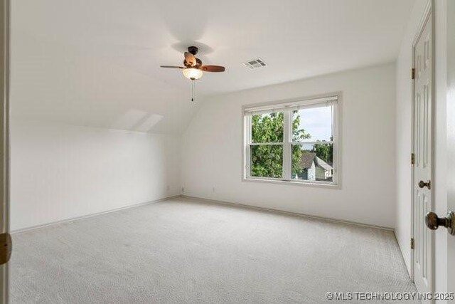 1620 S Florence Pl, Tulsa, OK 74104 - additional living space featuring carpet flooring, a ceiling fan, and lofted ceiling