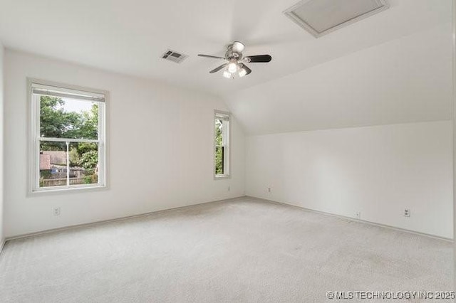 1620 S Florence Pl, Tulsa, OK 74104 - bonus room featuring healthy amount of natural light, light carpet, attic access, ceiling fan, and lofted ceiling