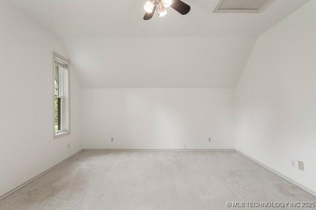 1620 S Florence Pl, Tulsa, OK 74104 - bonus room with lofted ceiling, light colored carpet, ceiling fan, and attic access