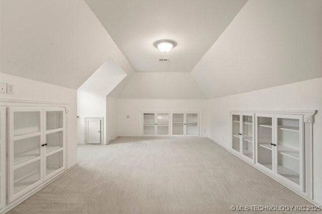 1620 S Florence Pl, Tulsa, OK 74104 - bonus room with vaulted ceiling and carpet flooring
