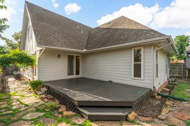 1620 S Florence Pl, Tulsa, OK 74104 - rear view of house featuring roof with shingles and a wooden deck