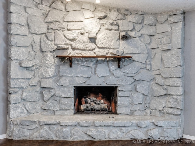 117 W Timberlane St, Broken Arrow, OK 74011 - detailed view of a fireplace and wood finished floors