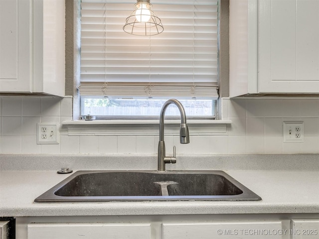 117 W Timberlane St, Broken Arrow, OK 74011 - kitchen view of white cabinetry, light countertops, and decorative backsplash