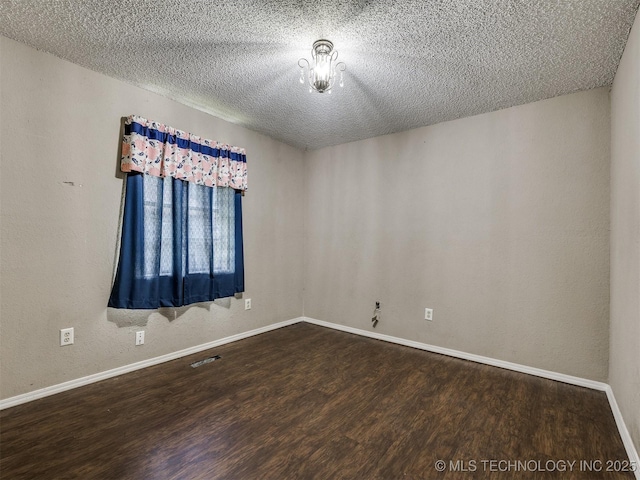 117 W Timberlane St, Broken Arrow, OK 74011 - unfurnished room featuring wood finished floors and a textured ceiling