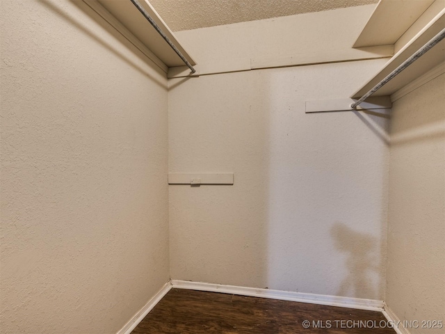 117 W Timberlane St, Broken Arrow, OK 74011 - walk in closet featuring dark wood-style flooring