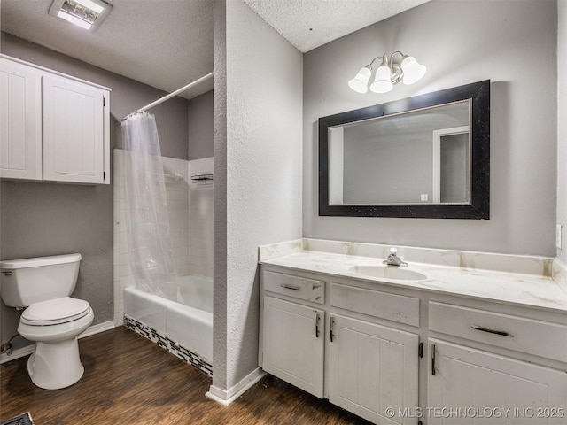 117 W Timberlane St, Broken Arrow, OK 74011 - bathroom featuring a textured ceiling, vanity, wood finished floors, shower / bath combination with curtain, and a textured wall