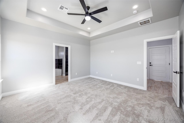 175 Maple Leaf Dr, Durant, OK 74701 - carpeted spare room with a tray ceiling, ceiling fan, recessed lighting, and a smoke detector