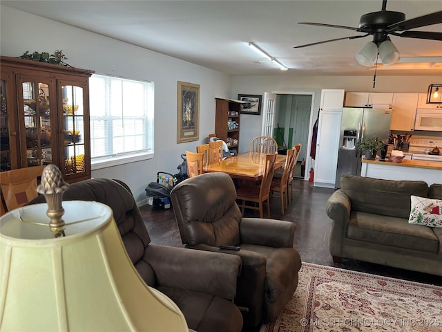 33803 S 4230th Rd, Inola, OK 74036 - living area with ceiling fan and finished concrete floors