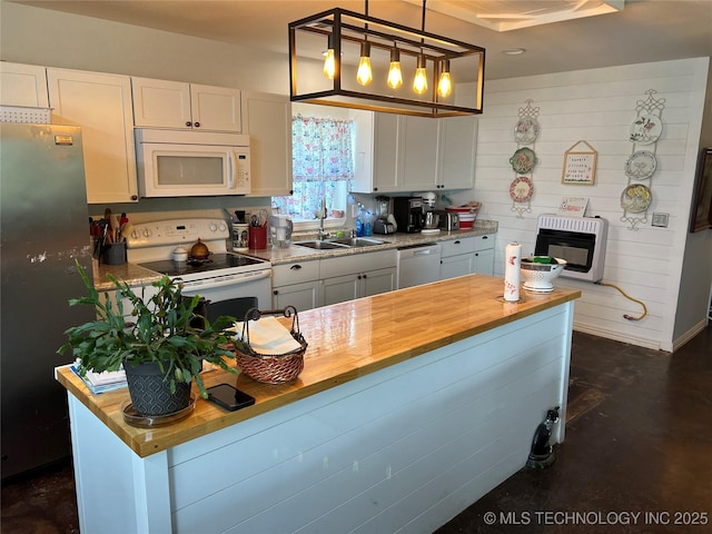 33803 S 4230th Rd, Inola, OK 74036 - kitchen featuring white appliances, heating unit, wood counters, and white cabinets