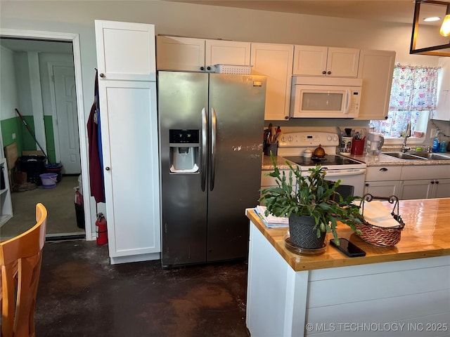 33803 S 4230th Rd, Inola, OK 74036 - kitchen with white appliances, finished concrete flooring, white cabinets, and wood counters