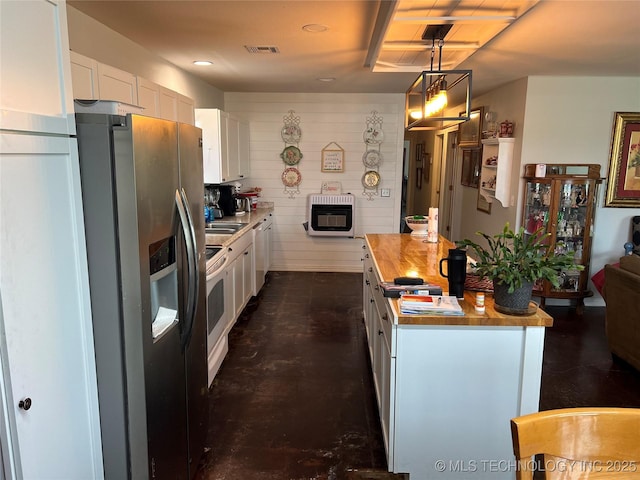 33803 S 4230th Rd, Inola, OK 74036 - kitchen with stainless steel refrigerator with ice dispenser, heating unit, white cabinets, a kitchen island, and butcher block countertops