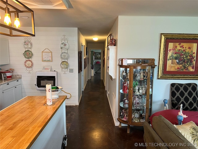 33803 S 4230th Rd, Inola, OK 74036 - hallway with heating unit and concrete flooring