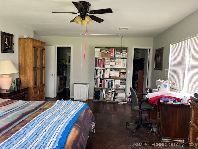 33803 S 4230th Rd, Inola, OK 74036 - bedroom featuring finished concrete floors and ceiling fan