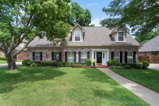 801 S Redwood Ave, Broken Arrow, OK 74012 - cape cod house featuring roof with shingles and brick siding