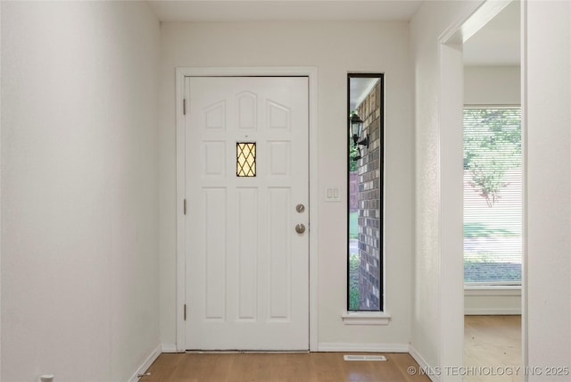 6905 S Redbud Ave, Broken Arrow, OK 74011 - entrance foyer featuring plenty of natural light and light wood-style floors