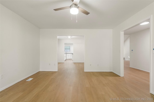 6905 S Redbud Ave, Broken Arrow, OK 74011 - empty room featuring light wood-style flooring and ceiling fan