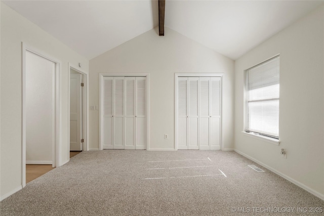 6905 S Redbud Ave, Broken Arrow, OK 74011 - unfurnished bedroom featuring two closets and carpet floors