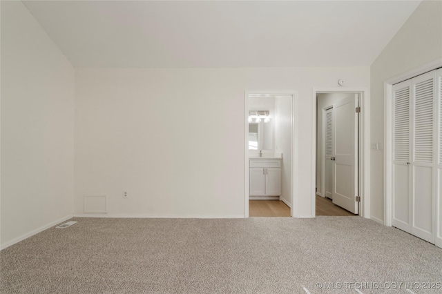 6905 S Redbud Ave, Broken Arrow, OK 74011 - unfurnished bedroom featuring carpet and ensuite bathroom