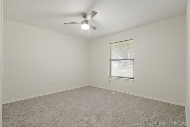 6905 S Redbud Ave, Broken Arrow, OK 74011 - carpeted spare room featuring ceiling fan and baseboards