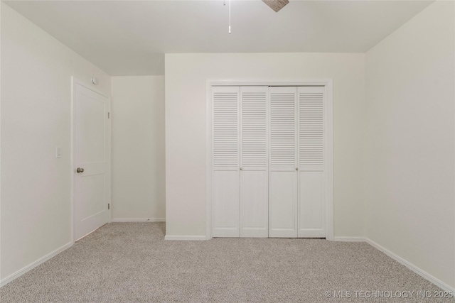 6905 S Redbud Ave, Broken Arrow, OK 74011 - unfurnished bedroom with light colored carpet and a closet