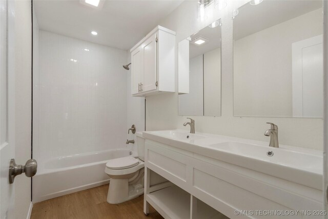 6905 S Redbud Ave, Broken Arrow, OK 74011 - bathroom featuring wood finished floors, tub / shower combination, and double vanity