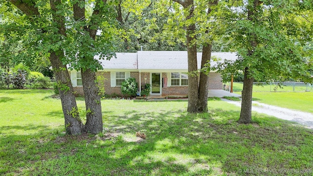 14174 County Road 3501, Ada, OK 74820 - single story home featuring brick siding and driveway