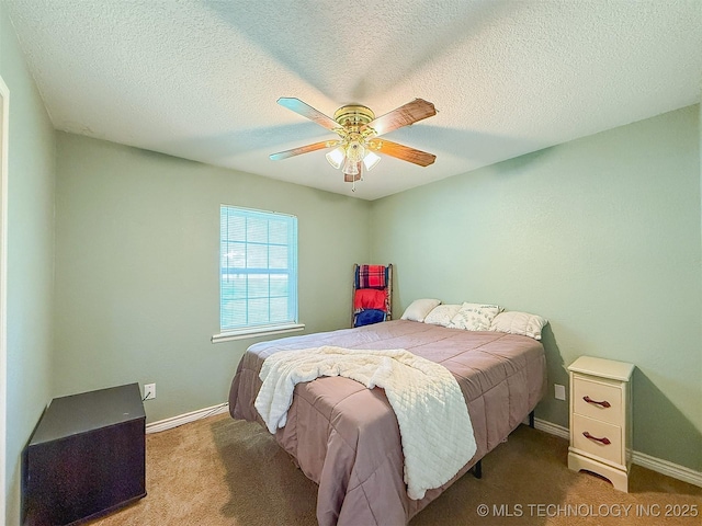 14174 County Road 3501, Ada, OK 74820 - bedroom featuring carpet flooring, a ceiling fan, and a textured ceiling