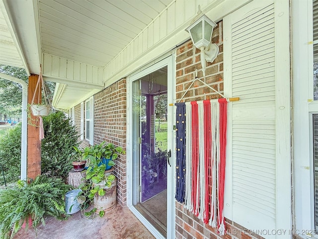 14174 County Road 3501, Ada, OK 74820 - entrance to property with brick siding and a porch