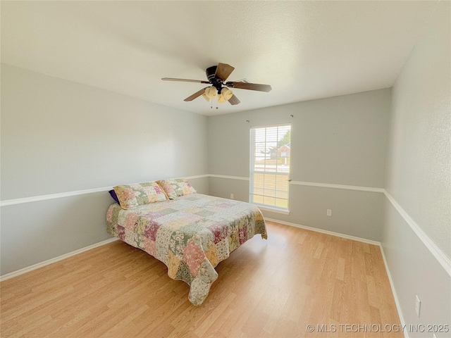 13155 E 132nd St N, Collinsville, OK 74021 - bedroom with wood finished floors and ceiling fan