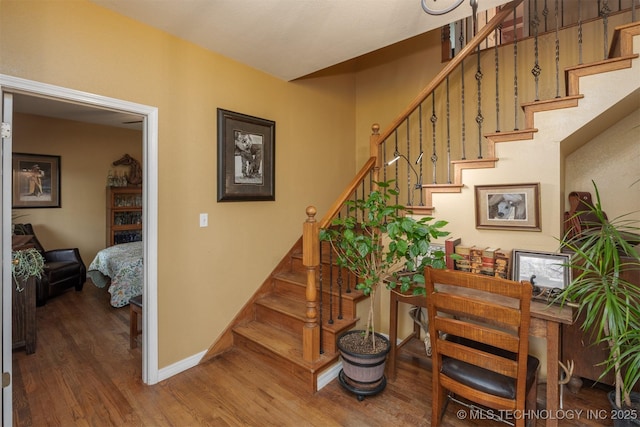 105074 N 3770, Okemah, OK 74859 - stairs with wood finished floors and baseboards