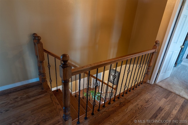 105074 N 3770, Okemah, OK 74859 - stairway featuring wood finished floors and baseboards
