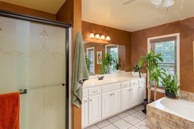 105074 N 3770, Okemah, OK 74859 - full bath featuring vanity, healthy amount of natural light, a garden tub, and tile patterned flooring