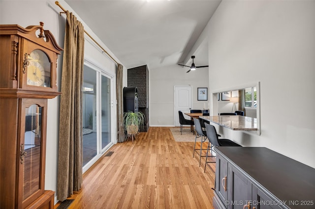 4620 S Winston Ave, Tulsa, OK 74135 - corridor featuring light wood-type flooring and vaulted ceiling