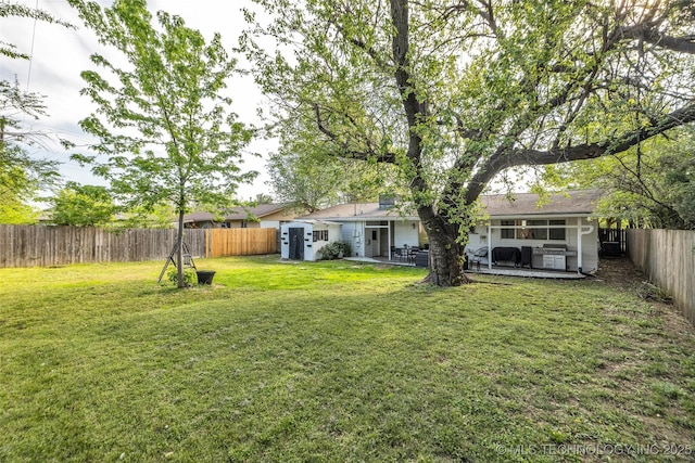 4620 S Winston Ave, Tulsa, OK 74135 - fenced backyard with a patio