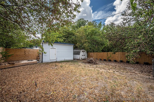 1208 NW 1st Ave, Ardmore, OK 73401 - fenced backyard with a shed