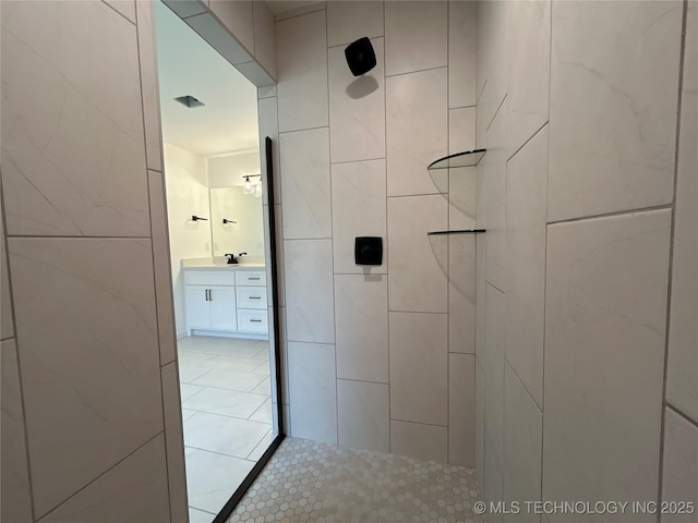 10416 E 132nd St S, Bixby, OK 74008 - full bath featuring tiled shower, vanity, and tile patterned flooring