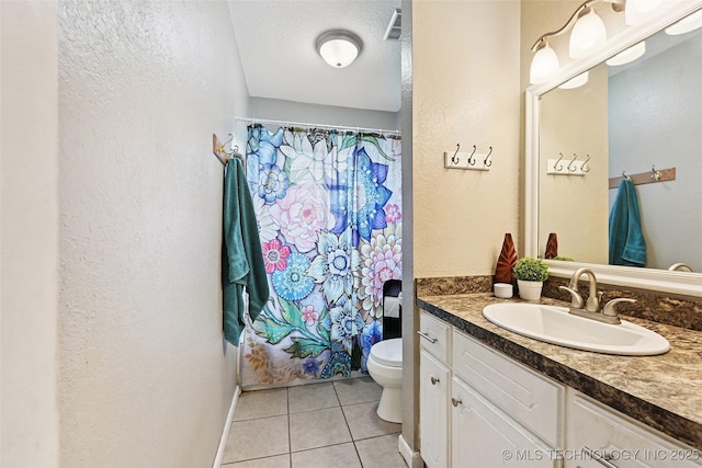 3104 Howard St, Sand Springs, OK 74063 - full bath with vanity, tile patterned flooring, a shower with shower curtain, a textured wall, and a textured ceiling