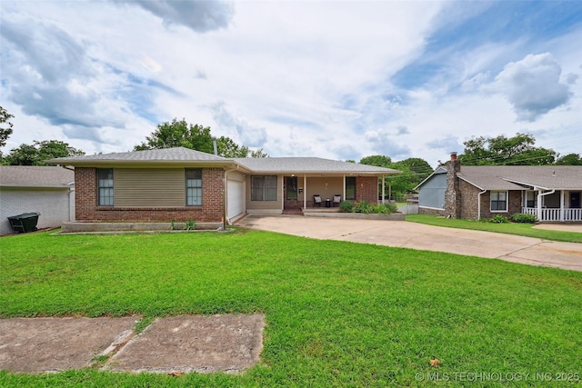 3104 Howard St, Sand Springs, OK 74063 - single story home featuring brick siding, concrete driveway, a garage, and a front yard