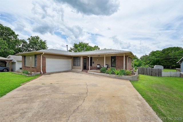 3104 Howard St, Sand Springs, OK 74063 - ranch-style home with a porch, a garage, concrete driveway, and brick siding