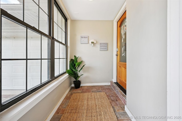 3104 Howard St, Sand Springs, OK 74063 - entryway with stone tile flooring and baseboards