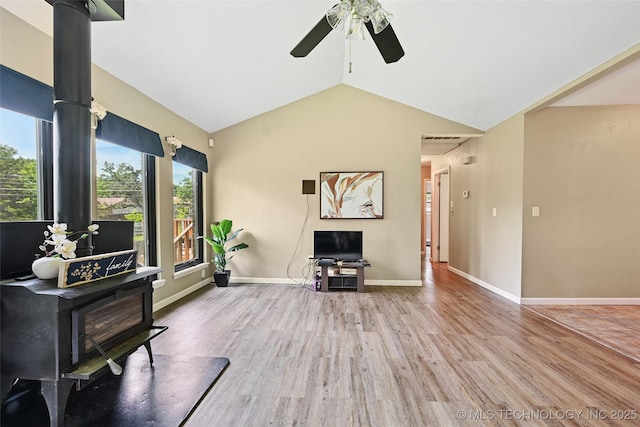 3104 Howard St, Sand Springs, OK 74063 - living area with ceiling fan, wood finished floors, and lofted ceiling