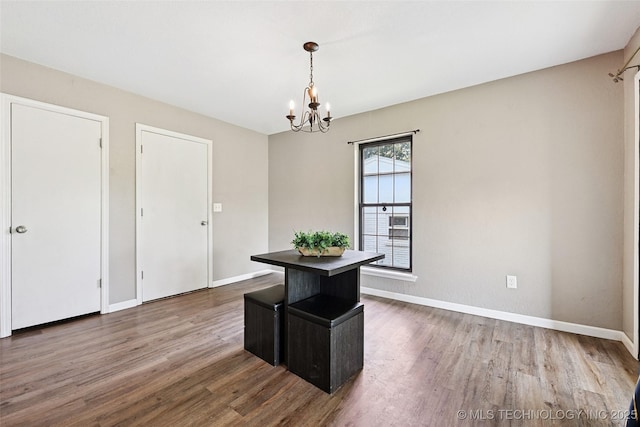 3104 Howard St, Sand Springs, OK 74063 - unfurnished dining area featuring a chandelier and wood finished floors