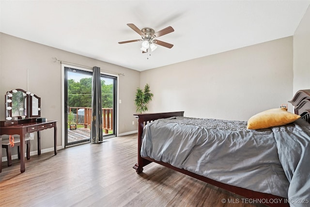3104 Howard St, Sand Springs, OK 74063 - bedroom with access to exterior, wood finished floors, and ceiling fan