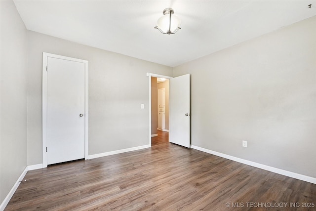 3104 Howard St, Sand Springs, OK 74063 - unfurnished bedroom with wood finished floors and a closet